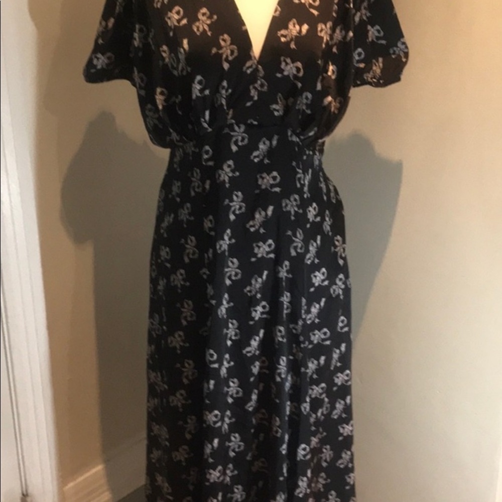 “BETSY JOHNSON” BOW PATTERN NAVY AND WHITE DRESS. - Picture 3 of 16